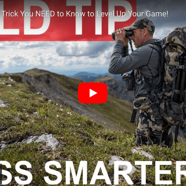 video cover image of a hunter on a mountain using his binoculars